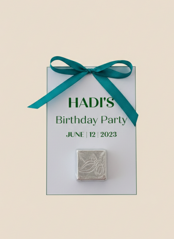 Invitation card for Hadi's birthday party with a teal ribbon on a beige background