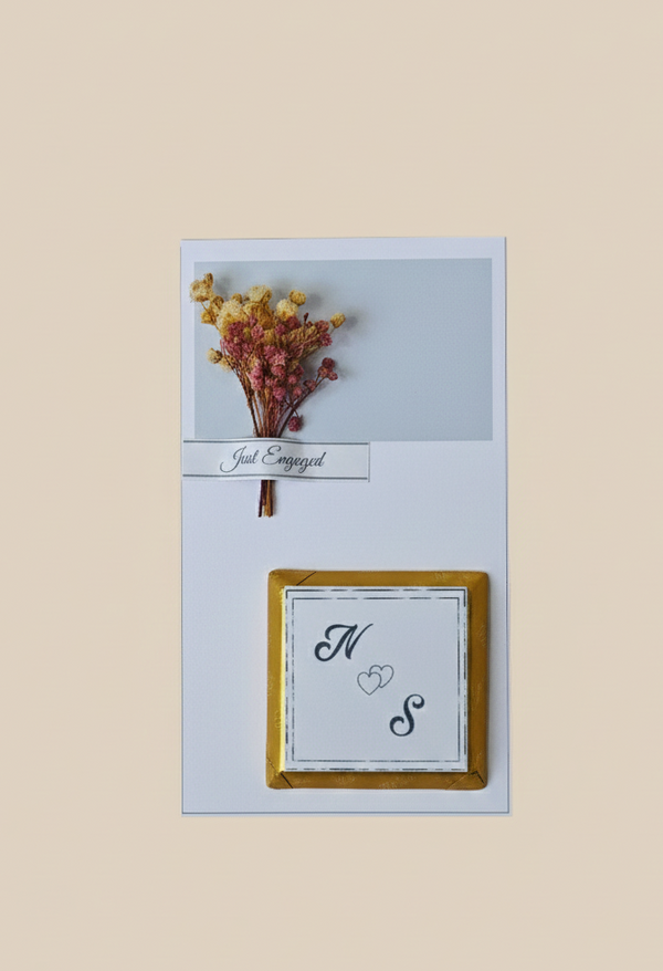 Decorative card with dried flowers and initials on a beige background
