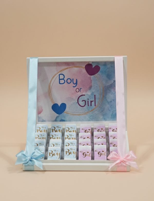 Decorative baby shower decision card with 'Boy or Girl?' text and heart designs on a beige background.