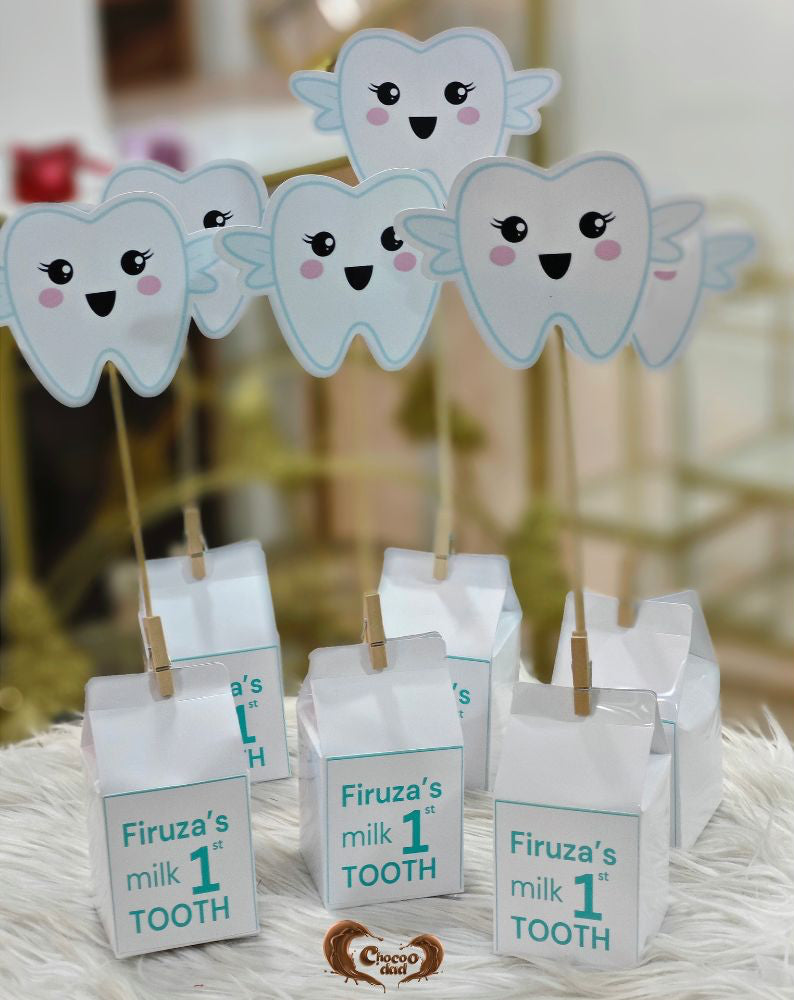 A charming way to celebrate Firuzə's first tooth with a sweet touch of Belgian milk chocolate