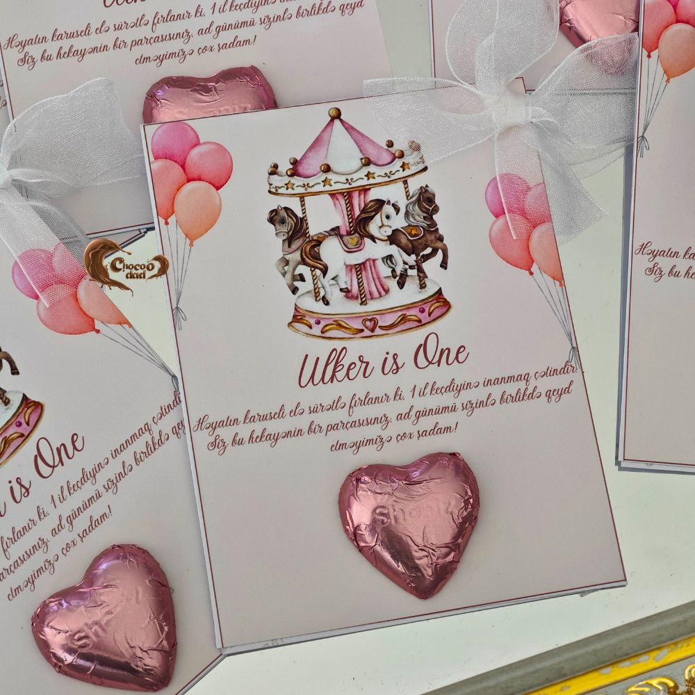 Celebrate a beautiful first birthday with carousel watercolor clipart-designed chocolate cards. These delightful cards feature a soft, pastel watercolor carousel design, perfect for adding a whimsical touch to a girl's first birthday party