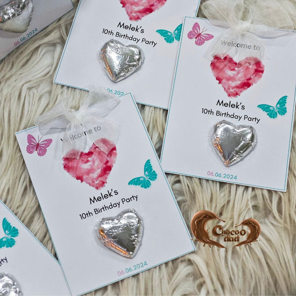 Celebrate a special milestone with these elegant white chocolate cards, designed exclusively for a 10-year-old girl's birthday party.