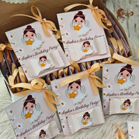 Celebrate your baby girl’s first birthday with our adorable angel holding a star-themed chocolate cards