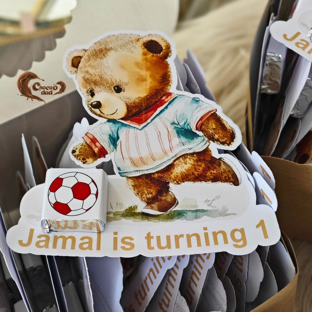 Celebrate your little one's first birthday with our adorable Football and Teddy Bear-themed chocolate cards