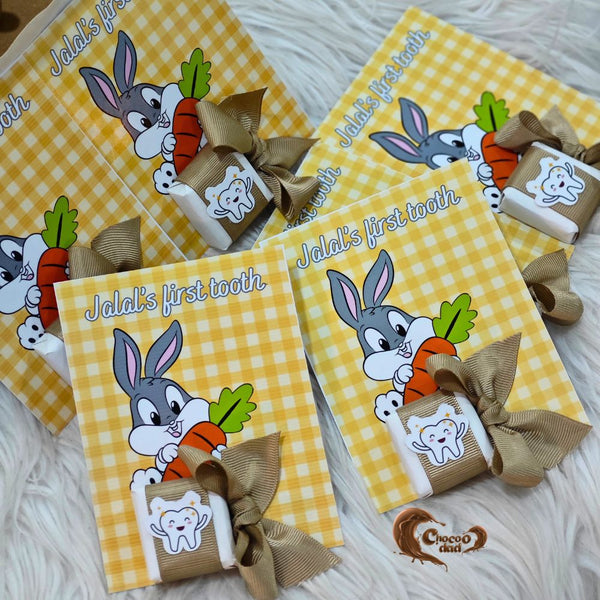Celebrate your little one's first tooth milestone with these adorable bunny-themed chocolate cards, designed to bring joy and sweetness to your special event! 🐇✨