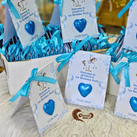 Chocolates are individually designed with a carousel theme, featuring charming details that perfectly suit a boy's first birthday celebration.