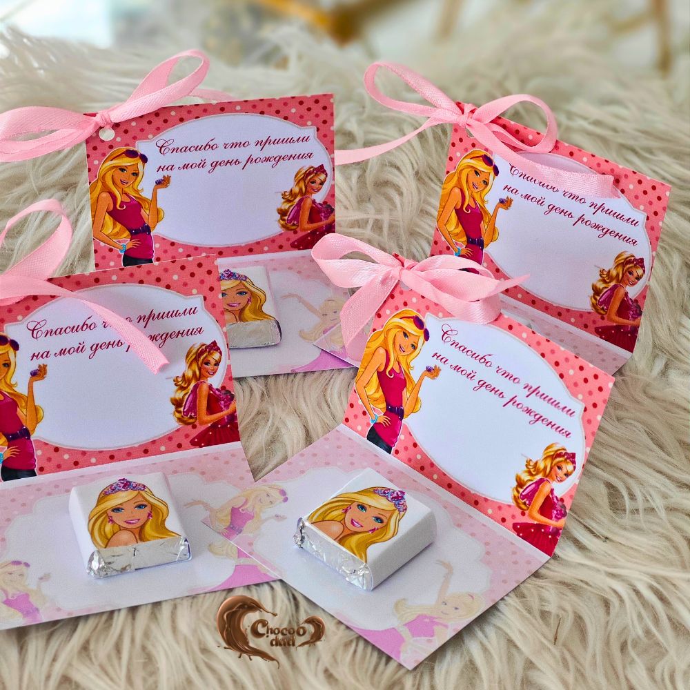 Delight your guests with these stylish and delicious chocolate cards that bring a touch of Barbie magic to your special day!