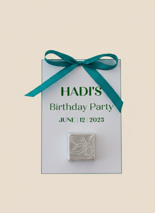 Invitation card for Hadi's birthday party with a teal ribbon on a beige background