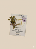 Decorative card with flowers and text on a beige background