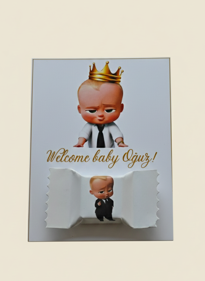 Card with cartoon baby in a suit and crown, text 'Welcome baby Oju!', on a light background.