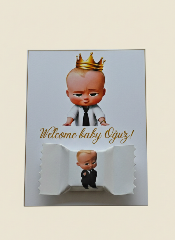 Card with cartoon baby in a suit and crown, text 'Welcome baby Oju!', on a light background.