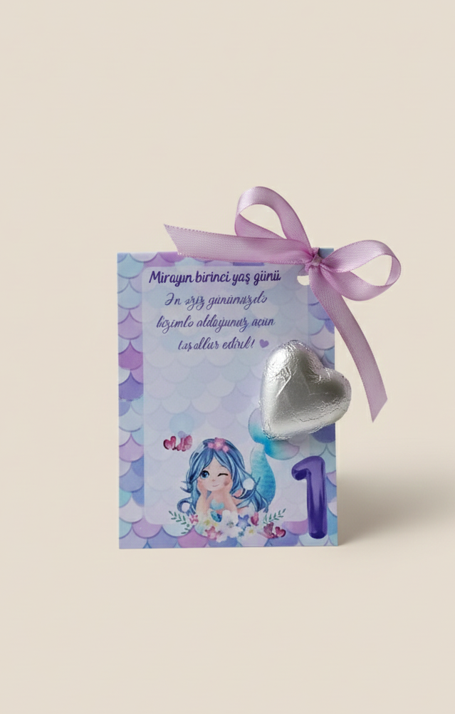 Children's birthday card with a heart-shaped balloon and ribbon on a light beige background