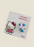 Card with Hello Kitty and a blue character on a light beige background