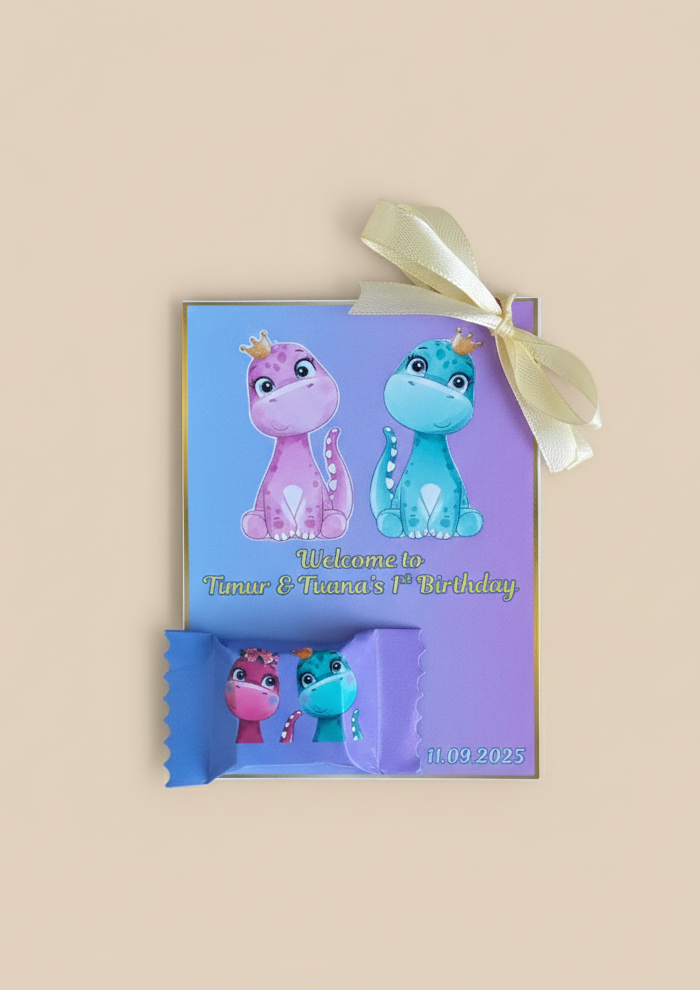 Purple gift bag with cartoon characters and a bow on a beige background