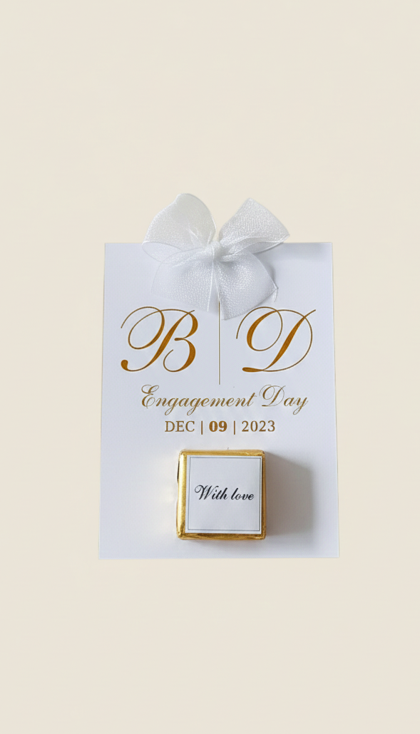 Engagement ring box with 'B D' initials and 'Engagement Day' text on a beige background