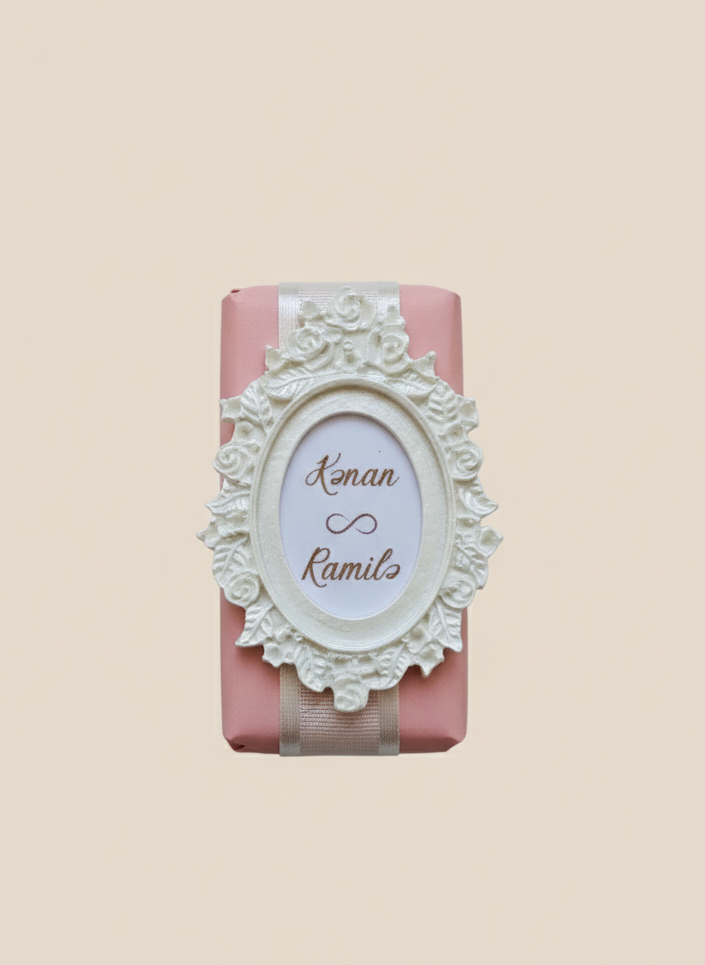 Decorative chocolate bar with ornate design and text on a beige background