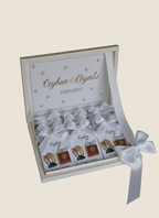 Ceyhan Royal tea boxes in a decorative box with a ribbon on a light beige background