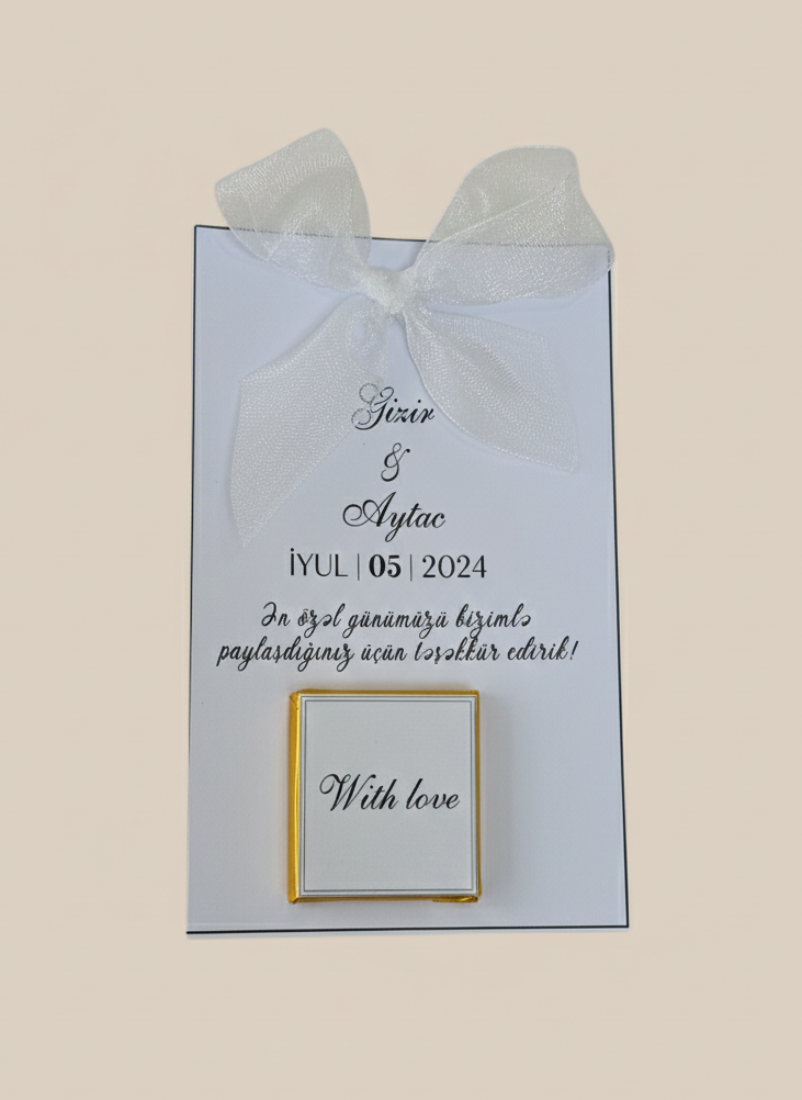 Wedding invitation card with text and a gold frame on a light blue background