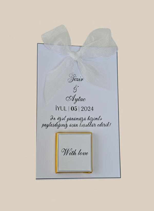 Wedding invitation card with text and a gold frame on a light blue background
