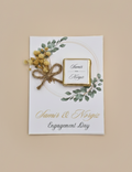 Invitation card with floral design and text on a beige background
