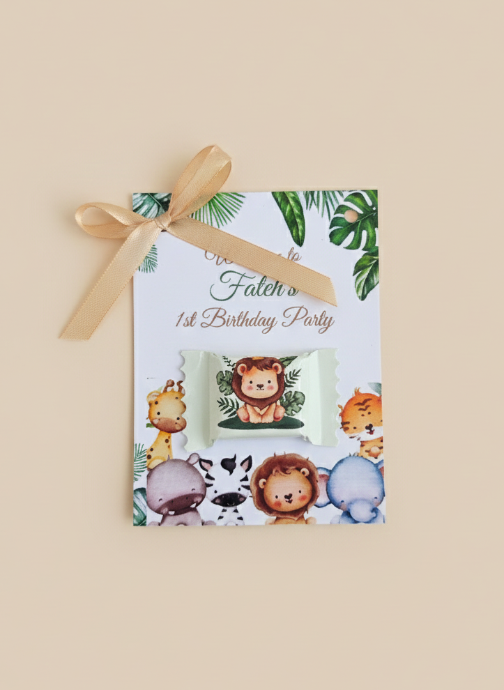 Birthday party invitation with animal illustrations and a gold ribbon on a beige background