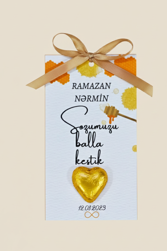 Decorative card with gold heart, ribbon, and text on a beige background