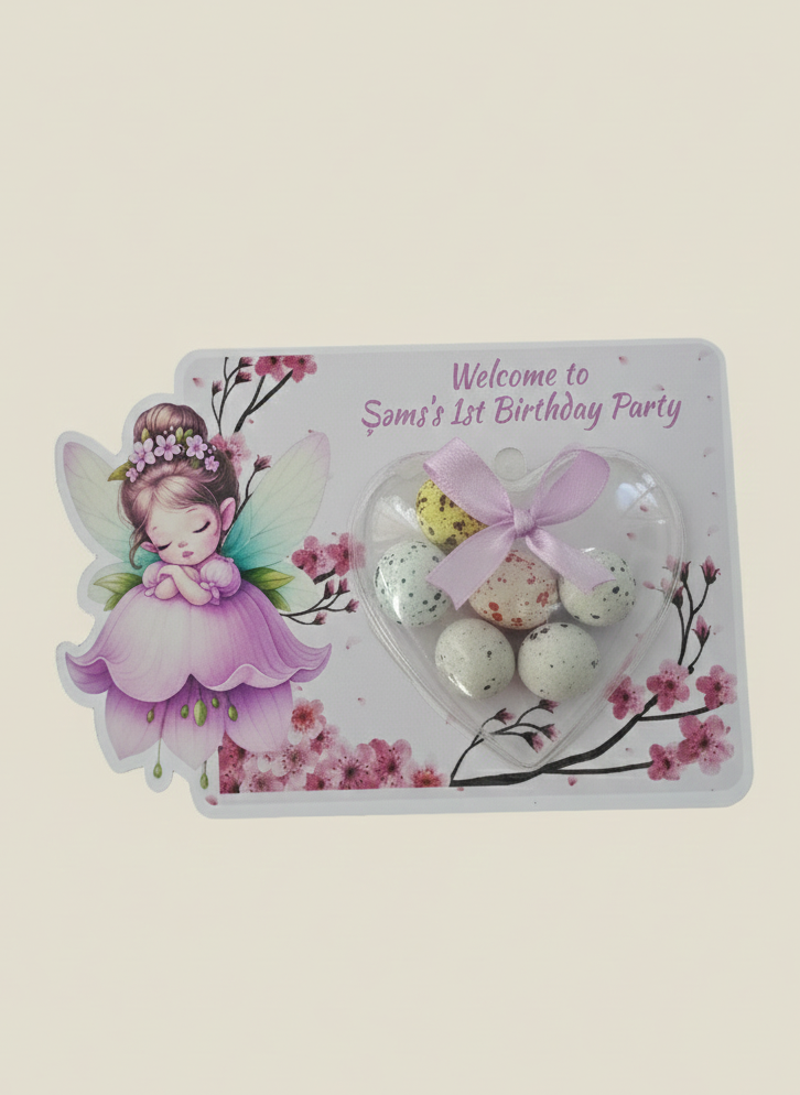 Decorative card for a fairy-themed birthday party with a fairy illustration and heart-shaped candy.