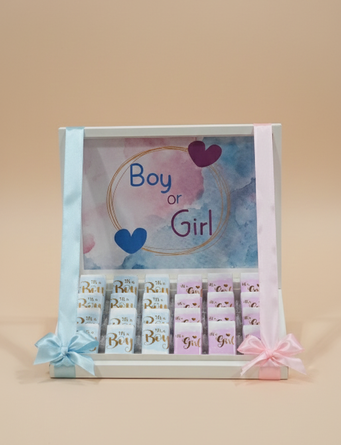 Decorative baby shower decision card with 'Boy or Girl?' text and heart designs on a beige background.