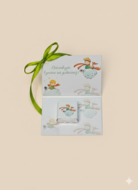 Greeting card with cartoon characters and a green ribbon on a beige background