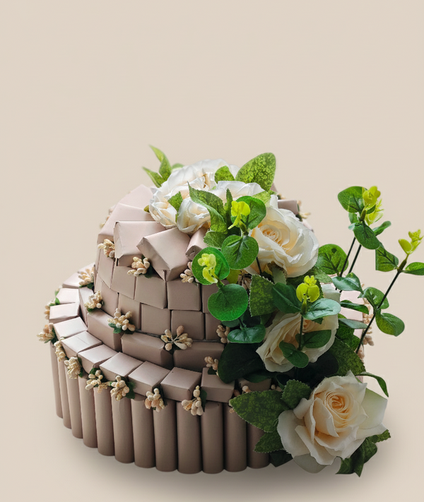 Two-tiered cake with floral decorations on a beige background
