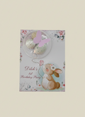 Children's birthday party invitation with bunny and balloons on a floral background