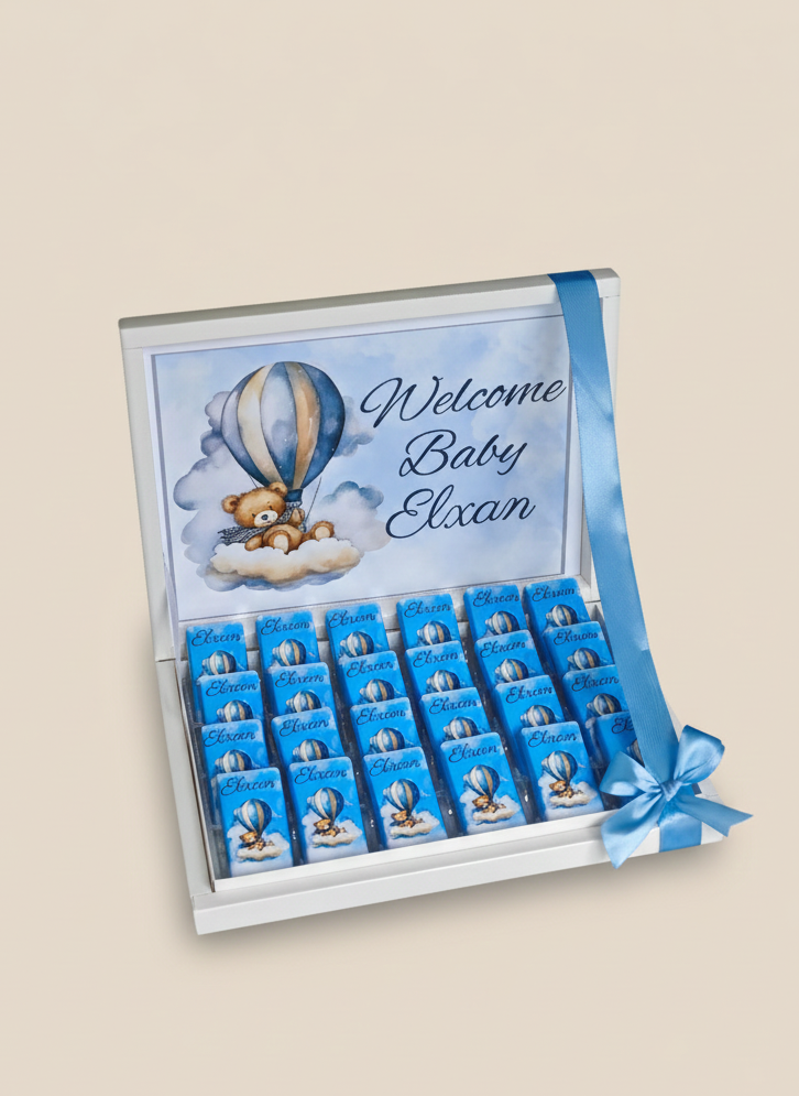 Gift box with chocolates and personalized message on a beige background