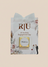 Personalized wedding favor bag with floral design and text on a beige background