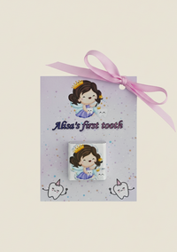Card with a fairy illustration and a small box labeled 'Alisa's first tooth' on a light beige background.