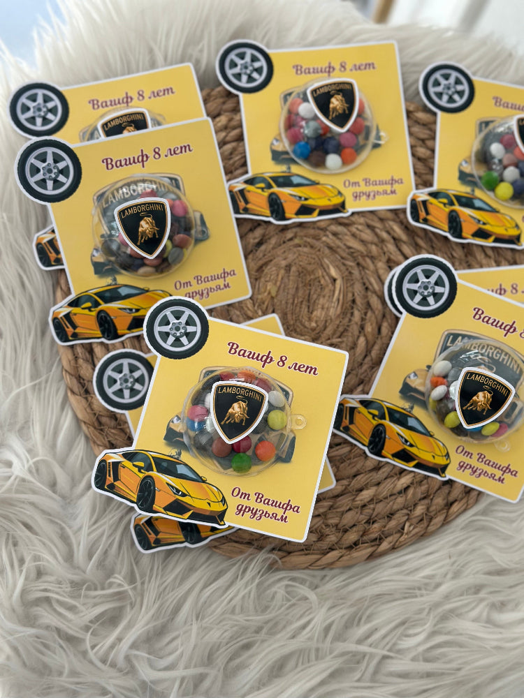 Stickers with car designs and logos on a textured surface