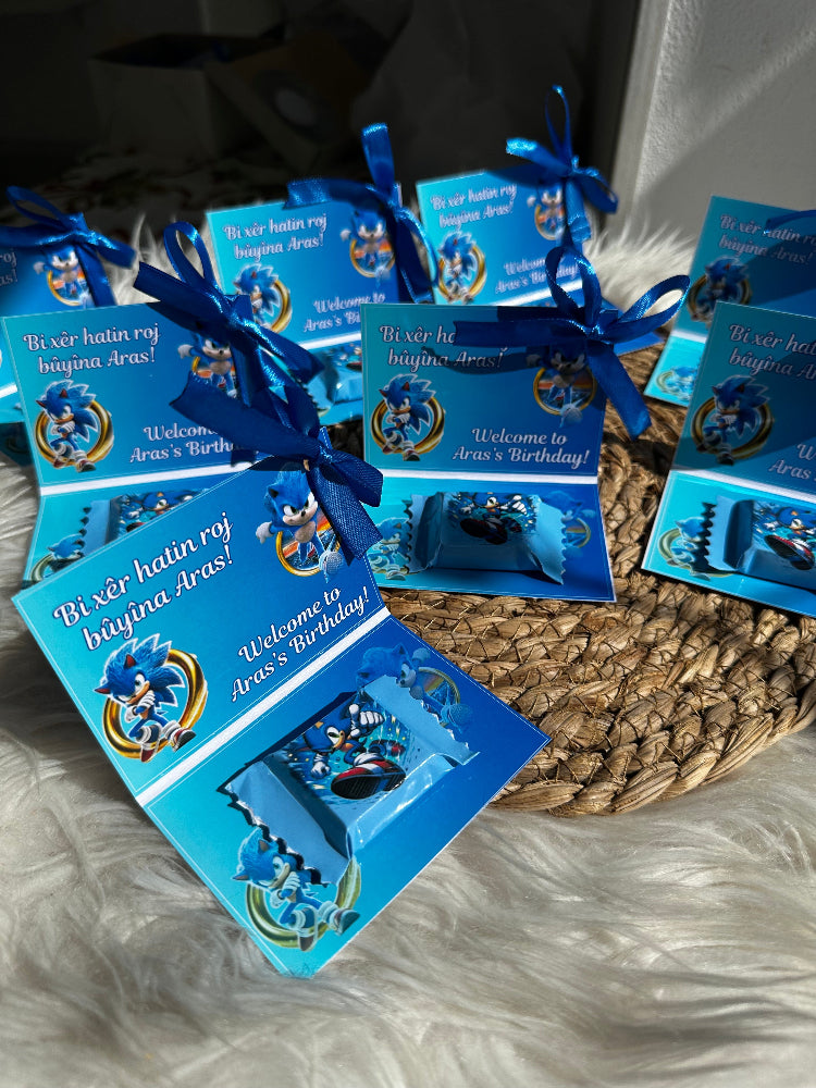Blue cards with decorative ribbons on a textured surface