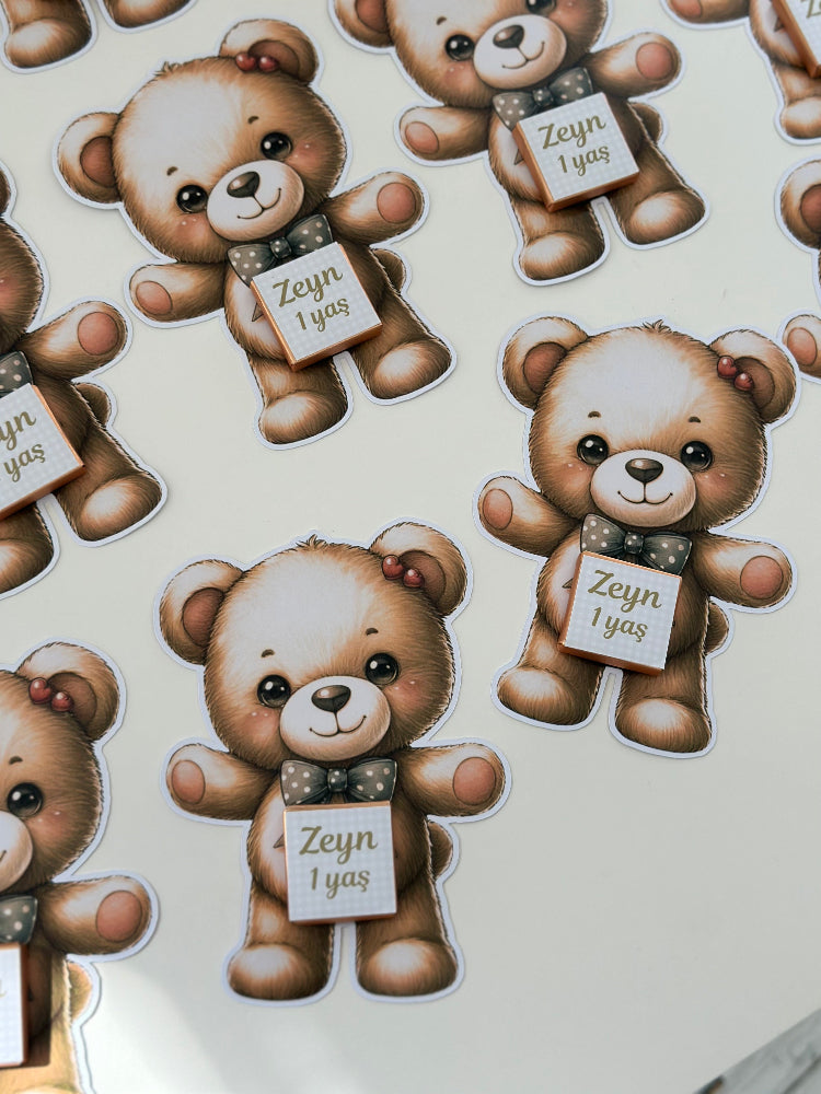 Stickers of teddy bears with name tags on a white background