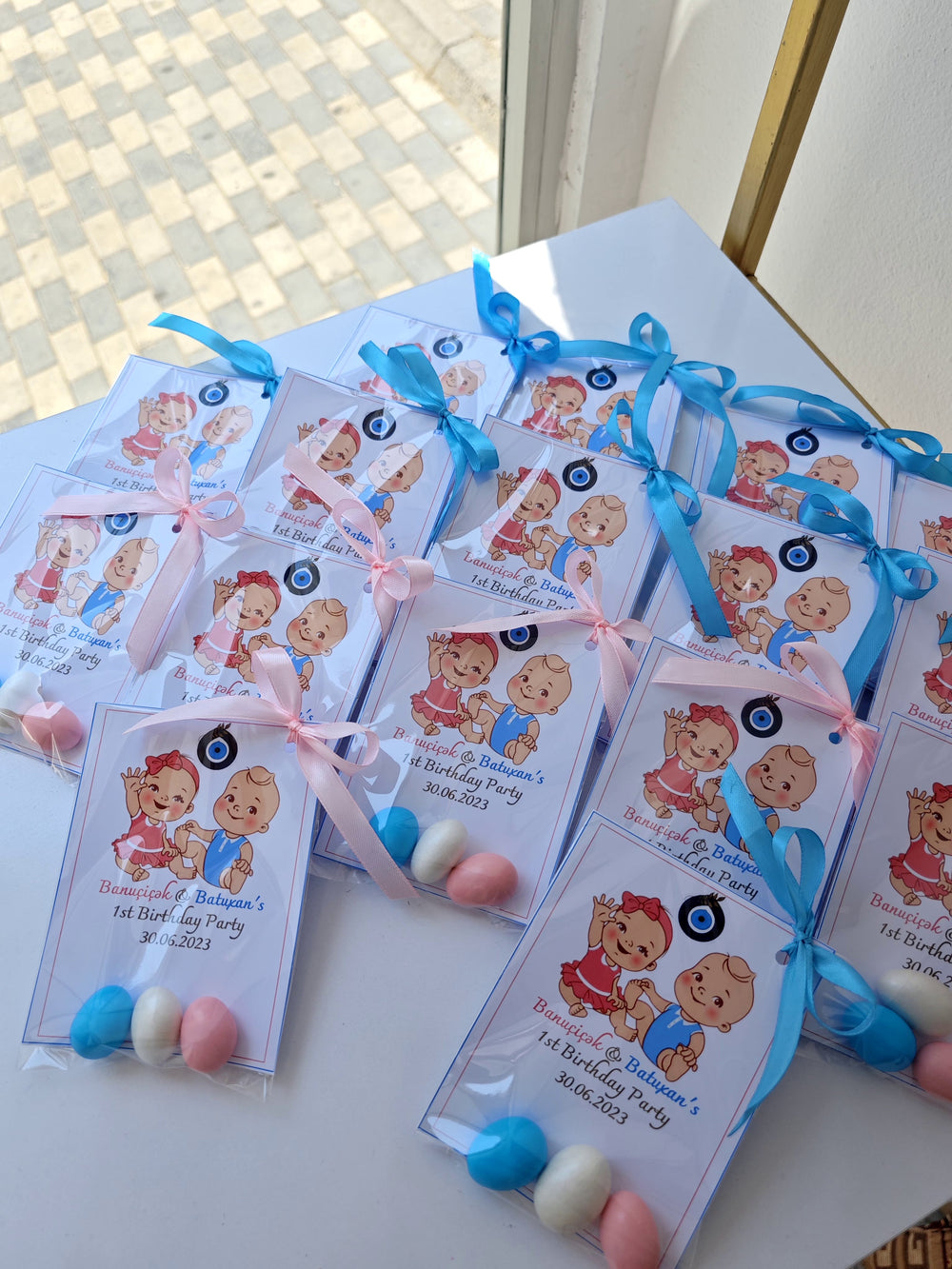 Customized Baby Birthday Party Favors with Evil Eye Charm for Twin babies