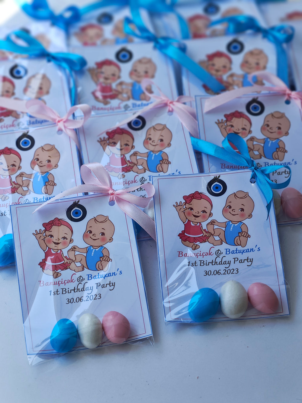 Customized Baby Birthday Party Favors with Evil Eye Charm for Twin babies