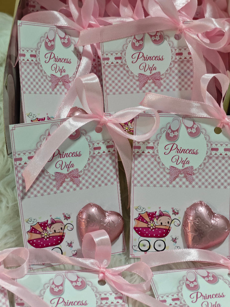Set of 'Princess Vela' themed cards with pink ribbons and heart-shaped decorations.
