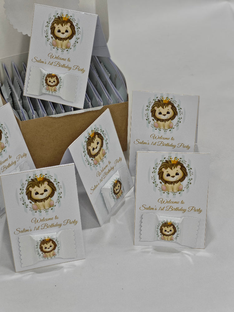 Set of birthday party invitations with lion graphics on a white background