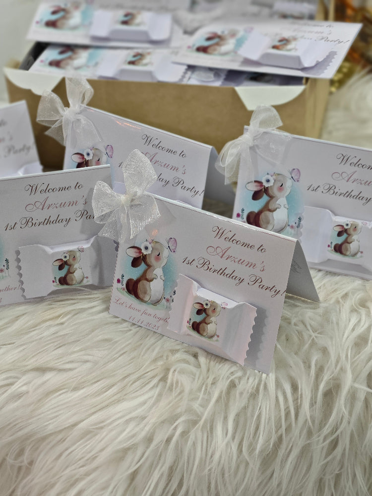 Set of birthday party invitations with animal illustrations on a textured surface