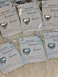 Silver Engagement Chocolate Card with “First Step to Happiness” Message and Light Blue Ribbon