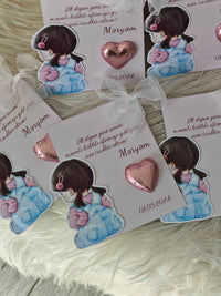 Stickers with cartoon character and heart-shaped pin on white cards with text