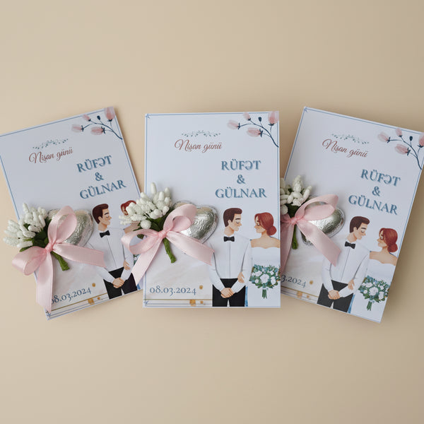 Collection of wedding invitations with cartoon characters and decorative elements on a table.