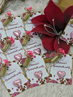 Chinara's Bachelorette party invitations with floral and heart designs on a textured surface.
