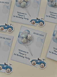 Invitation cards for Timur's 1st birthday party with vintage car designs and balloons.