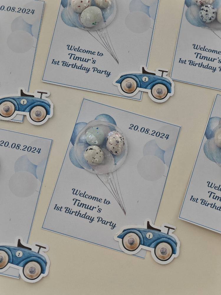 Invitation cards for Timur's 1st birthday party with vintage car designs and balloons.