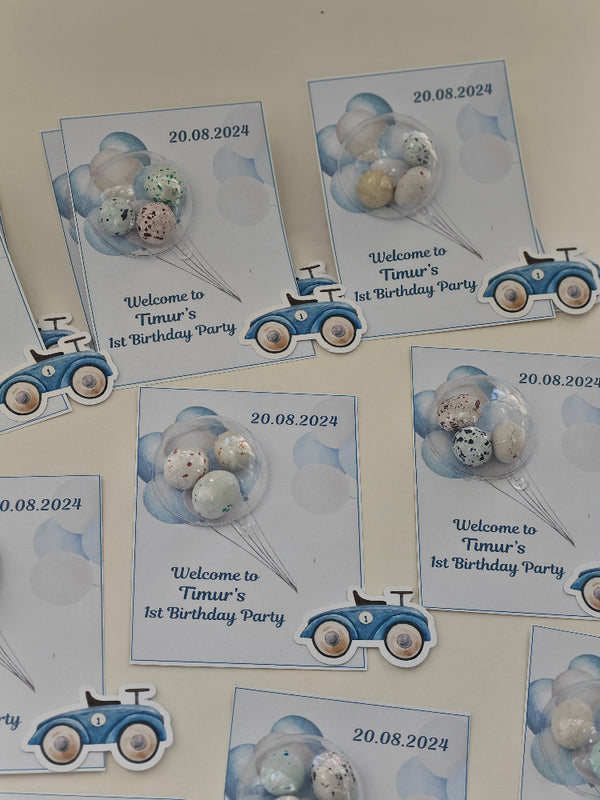 Set of birthday party invitations with blue cars and teddy bears on a white background