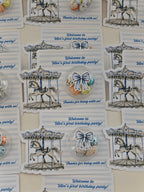 Stickers with carousel design and birthday party text on a white background